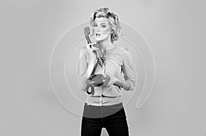 Phone call. Woman talking on the phone, vintage style. Excited pin up girl, pinup style. Beautiful woman in pin up style