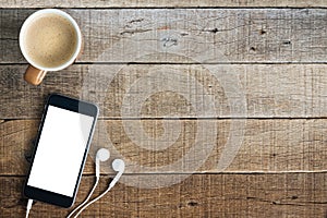 Phone and coffee on wood