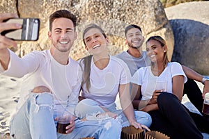 Phone, drinks and friends taking a selfie on beach enjoying summer holiday, vacation and weekend getaway. Travel