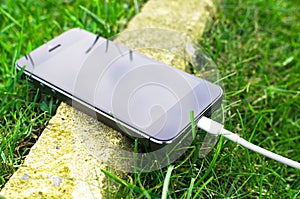 Phone on grass