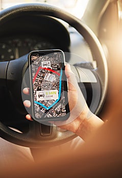 Phone, map and hands of person in a car for location, search or navigation closeup. Smartphone, travel and driver check