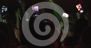 Phone, people and post for social media, nightclub and dj for new year celebration, energy and crowd. Audience, music