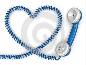 Phone reciever and cord as heart. Love hotline concept. photo