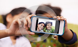 Phone screen, photography and kid siblings on a floor for fun, vacation or memory at home from above. Smartphone, selfie