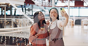 Phone selfie, women and friends with peace sign at mall taking pictures for social media. Bokeh, hand gesture and girls