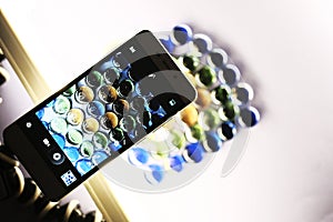 the phone takes pictures of transparent glass balls with backlight