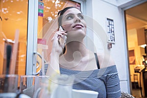 Phone talk in a coffee shop