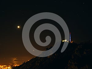 Phone tower antenna at night on a background of the starry sky