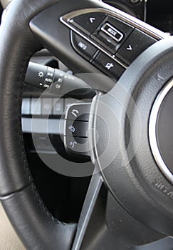 Phone And Voice Controls And Menu Mode Buttons On A Multifunctional Steering Wheel