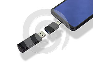 Phone on a white background data transfer via a universal USB flash drive adapter