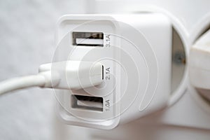 Phone white wall charger for mobile devices with USB output
