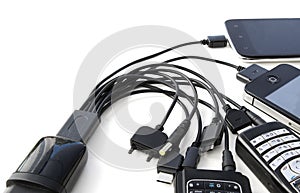 phones are connected to different types of charger connectors