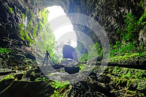 Phong Nha Ke national park / Vietnam, 15/11/2017: Woman entering the Hang Tien cave in the Phong Nha Ke national park in Vietnam