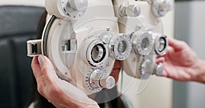 Phoropter, eye test and optometrist for vision, medical practice for optical exam or consultation. Optometry, technology