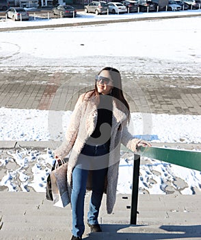 Photo 9. Happy young girl with black long hair. Shopping. 2022