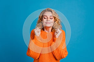 Photo of adorable lovely cute woman wear trendy orange clothes want wich desire isolated on blue color background