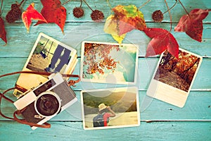 Photo album in remembrance and nostalgia in autumn fall season on wood table. photo