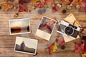 Photo album in remembrance and nostalgia in autumn & x28;fall season& x29; on wood table photo