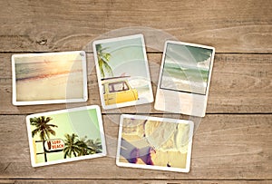 Photo album remembrance and nostalgia journey in summer surfing beach trip on wood table.