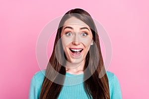 Photo of amazed shocked surprised young cute woman reaction face news isolated on pink color background