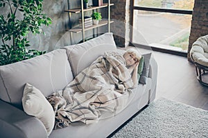 Photo of amazing blond aged granny having daydream lying comfort sofa divan covered plaid blanket dreamy cute hold hands
