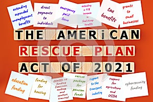 Photo on The American Rescue Plan Act of 2021 theme. wooden cubes with the inscription `The American Rescue Plan Act of 2021` photo