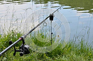 Photo of angling rod over the water