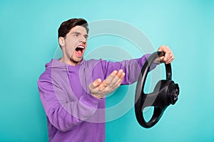 Photo of angry furious card driver arguing screaming stuck in jam low traffic hold steering wheel isolated on blue color