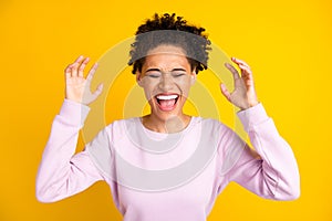 Photo of angry mad afro american upset woman scream bad mood isolated on yellow color background