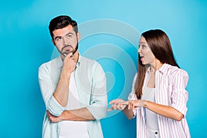 Photo of arguing sad young couple wear casual shirt quarreling conflict isolated blue color background