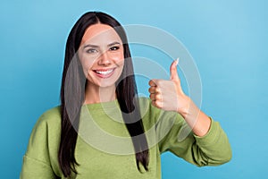 Photo of attractive business lady showing thumb-up recommend her company isolated on blue color background