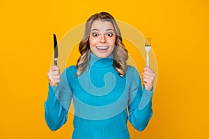 Photo of attractive charming wavy lady hold metal knife fork ready to start tasty food dinner meal good appetite wear