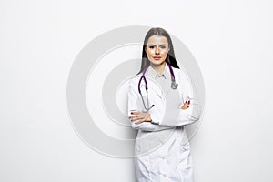 Photo of attractive family doc lady patients consultation beaming friendly smiling reliable virology clinic arms crossed wear