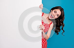 Photo of attractive impressed excited lady hold hands side empty advert banner sales manager read information wear