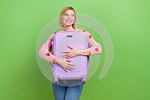 Photo of attractive young woman suitcase look empty space dressed stylish pink strawberry print clothes isolated on
