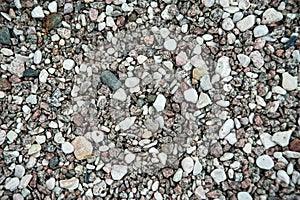 Photo background of small eamens of granite and pebbles