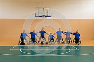photo of the basketball team of war invalids with professional sports equipment for people with disabilities on the
