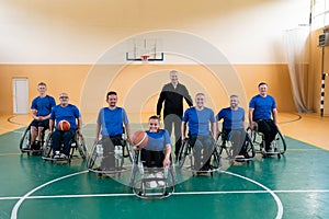 photo of the basketball team of war invalids with professional sports equipment for people with disabilities on the