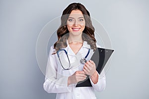 Photo of beautiful cheerful professional doc practitioner intern lady hold patient papers medical prescriptions wear