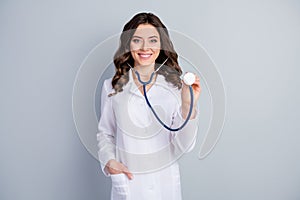 Photo of beautiful cheerful professional family doc lady examining patient using stethoscope listening heart beat check