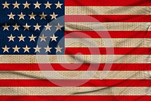 Photo of the beautiful colored national flag of the modern state of USA on textured fabric, concept of tourism, emigration,
