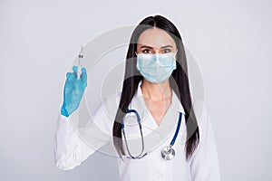 Photo of beautiful doc lady ready for operation young professional surgeon hold anesthesia syringe wear mask gloves photo