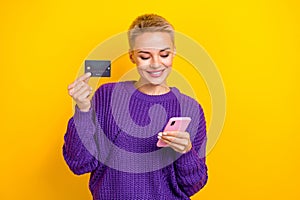 Photo of beautiful pretty blogger young short blonde hairdo hold browse smartphone new shop for ecard bank isolated on