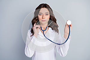 Photo of beautiful professional doc serious lady examining patient using stethoscope listening heart beat check