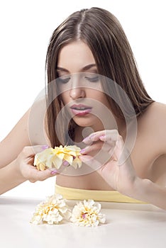 Photo of beautiful woman guessing with flowers