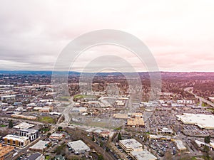 A photo of Beaverton, Oregon, USA, at sunset, a suburb. A photo from a height at sunset or sunrise. Design background