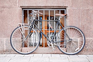 Photo of bicycle at window