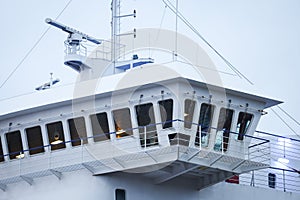 Photo of big cargo ship bridge with windows and other details