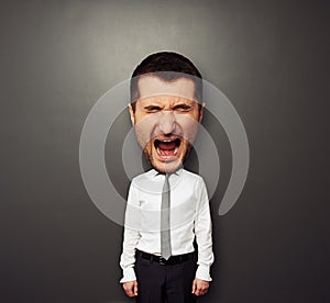 Photo of bighead screaming man