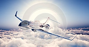 Photo of black luxury generic design private jet flying in blue sky. Huge white clouds and sun at background. Business photo